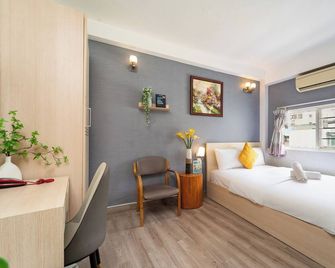 Grad Galaxy Boutique Hotel - Ho Chi Minhin kaupunki - Makuuhuone