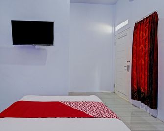 Hotel O Niza Guesthouse Syariah - Banyuwangi - Habitación