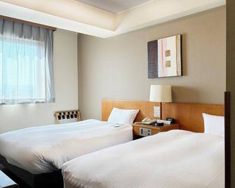 Hotel Route-Inn Nagaizumi Numazu Inter 1 - Nagaizumi - Bedroom