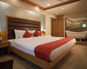 The Metropole by Keyboard Hotels - Lonavala - Camera da letto