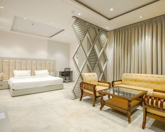 Hotel The Reef - Chandigarh - Schlafzimmer