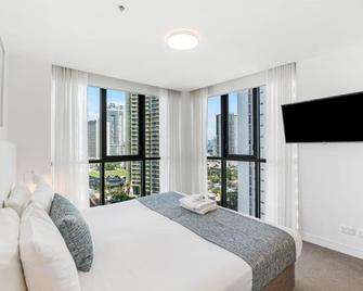 منتجع رابسودي - الرسمي - سورفرس باراديس - غرفة نوم