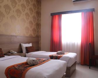 New d'Dhave Hotel - Padang - Habitación