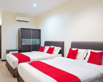 Hotel O Utama Inn - Bintulu - Schlafzimmer