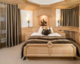 Apartments Villa Gardena - Gardenahotels - Selva di Val Gardena - Bedroom