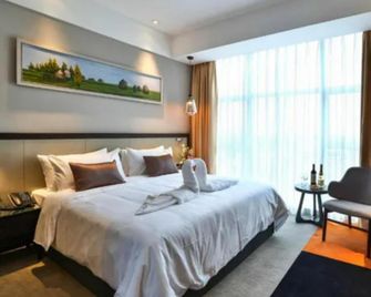 Ramada Encore by Wyndham Guanghan - Deyang - Bedroom