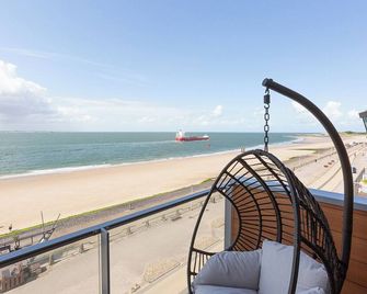 بيتش فرونت بوتيك هوتل - فليسينغين - شرفة