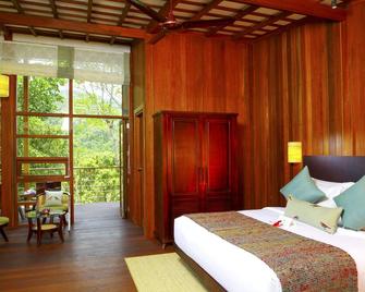Niraamaya Retreats Cardamom Club - Thekkady - Bedroom
