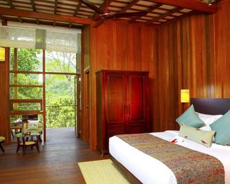 نيرامايا كارداموم كلوب - ثيكادي - غرفة نوم