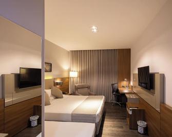 JL Hotel by Bourbon - פוז דו איגוואסו - חדר שינה