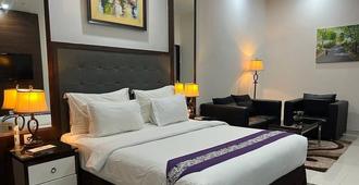Ayla City Hotel - Sorong - Habitación
