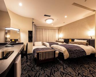 Apa Hotel Kanazawa Ekimae - קאנאזוואה - חדר שינה