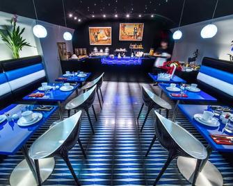 أوتل سبليندوغ إليزيه - باريس - مطعم