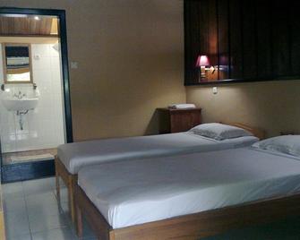 Ue Datu Cottages - Tentena - Habitación