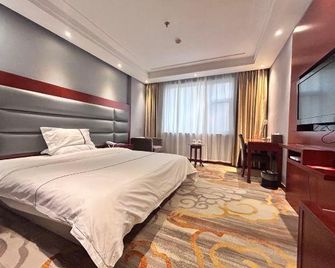 Taoyuan Hotel - Linyi - Bedroom