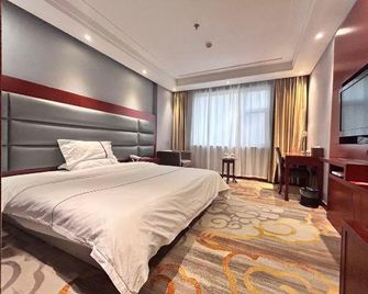 Taoyuan Hotel - Linyi - Schlafzimmer