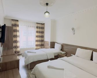 Toprak Hotel - Ван - Спальня