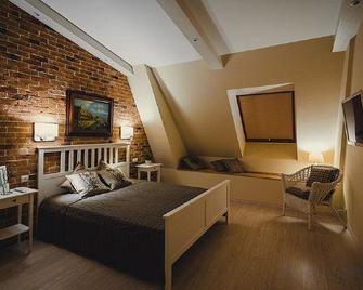 Glarus Hotel - Murmansk - Schlafzimmer