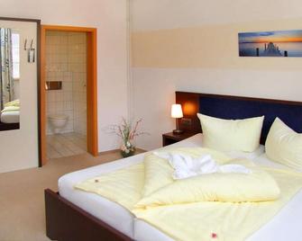 Hotel Müritzterrasse - Bollewick - Schlafzimmer
