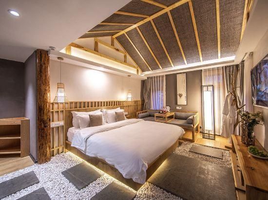Lijiang Muqian Hotel - ליז'יאנג - חדר שינה