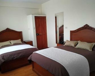 Hostal Terrabella Srl - La Paz - Schlafzimmer