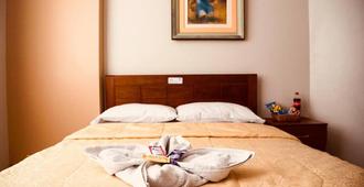 Hotel Jorge Chavez - טרוחיו - חדר שינה