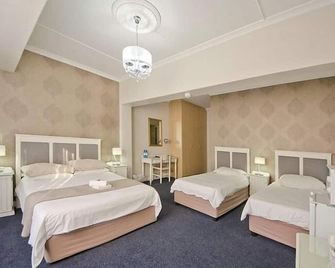 The Russel Hotel - Knysna - Schlafzimmer