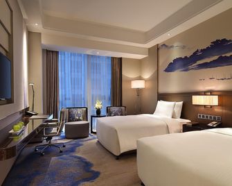 Wanda Realm Neijiang - Neijiang - Schlafzimmer