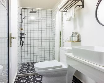 Huali Travel Jiangjing Inn (Guilin Railway Station) - Guilin - Bedroom