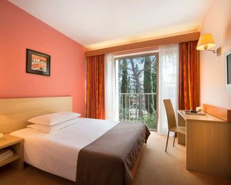 ريميسينز هوتل لوكيجا - بورتوروز - غرفة نوم