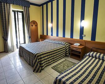 Hotel Ristorante Umbria - אורבייטו - חדר שינה