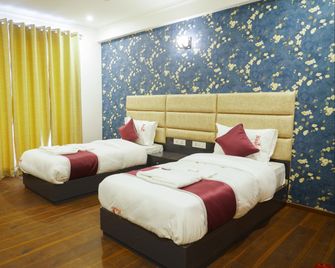Lime Tree Hotel The Pulkit - Gurugram - Bedroom