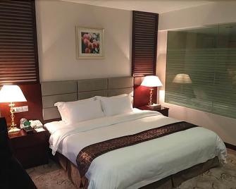 Kecheng Holiday Hotel - Guangzhou - Bedroom