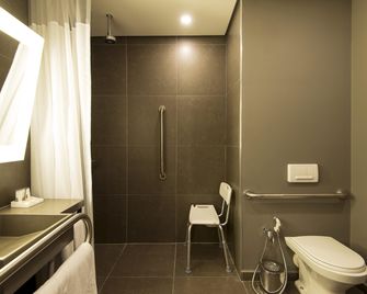 نوفوتل سانتوس جونزاجا - سانتوس - غرفة نوم