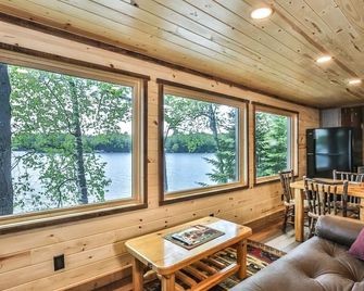 Remodeled lakeside resort cabin with fireplace, sandy beach, dock, firepit! - Saint Germain - Living room