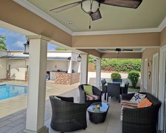 Sunflower Villa - Samaan Grove Estates, Canaan, Secure/Gated Luxury - Bon Accord Village - Patio