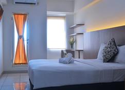 Candiland Apartment - Semarang - Schlafzimmer