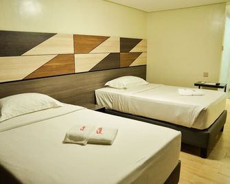 Travelite Hotel Legarda - Baguio - Schlafzimmer