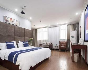 Greentree Inn Changzhou Dinosaur City Qingyang North Road Business Hotel - Changzhou - Schlafzimmer