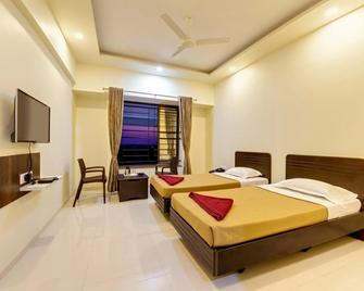 Galaxy Inn - Kolhapur - Habitación