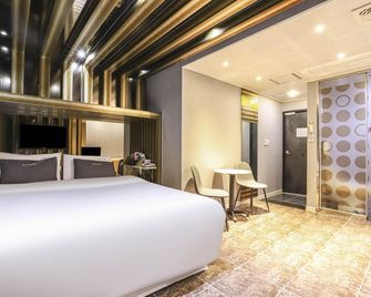 Gyeongju Rose Hotel Hwangni Dan-gil Branch - 慶州 - 臥室