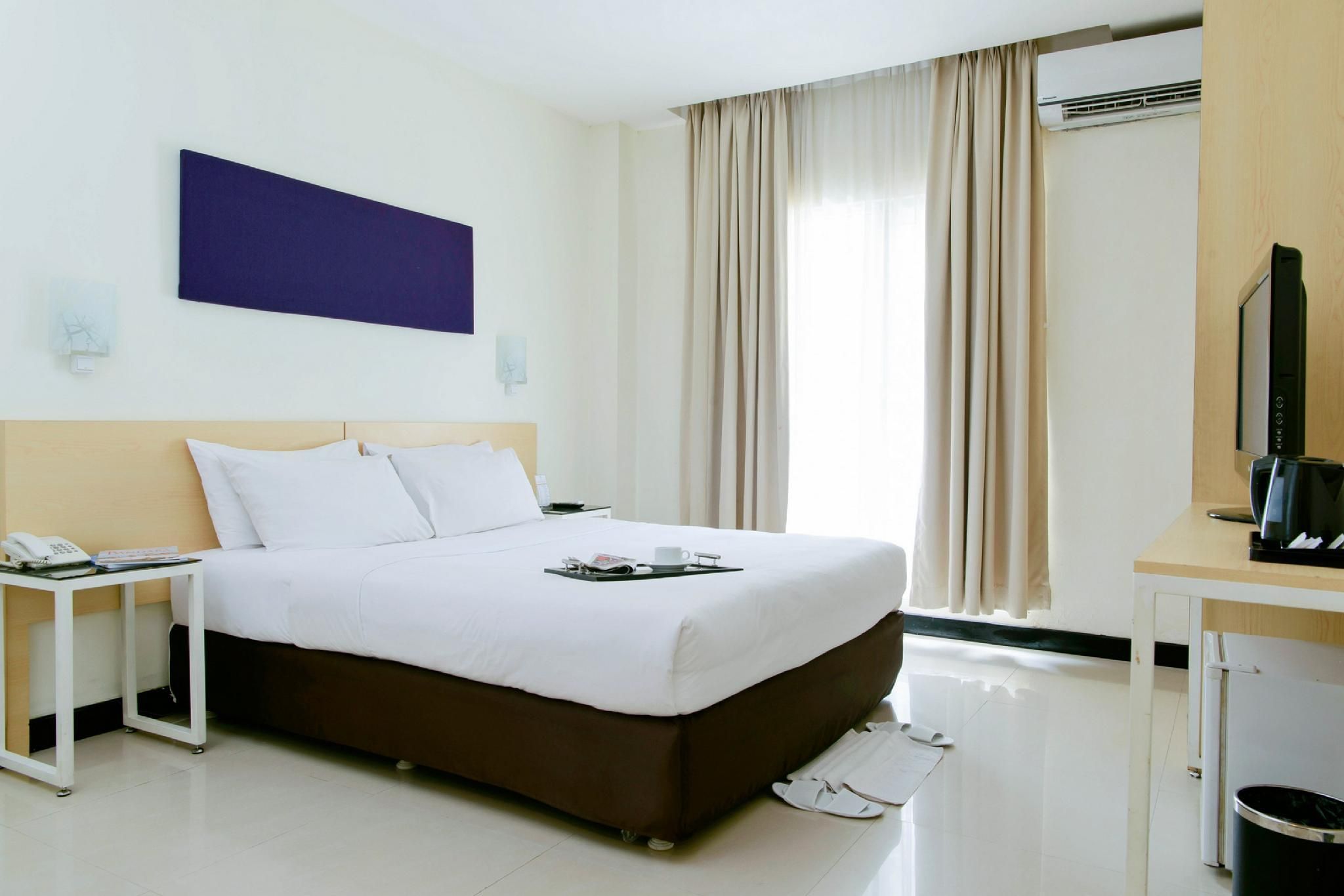 Griya Sintesa - מאנאדו - חדר שינה