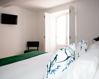 Trovador Guest House - Guimarães - Habitación