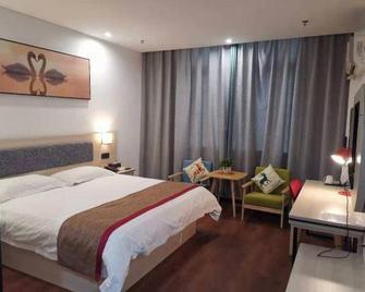Motel 168 Chizhou Cuibai Road Branch - Chizhou - Bedroom