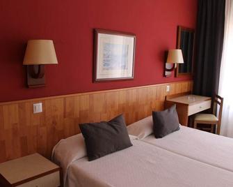 Hostal Regina - Blanes - Slaapkamer