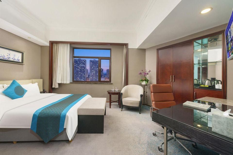 Lee Wan Hotel - דאליין - חדר שינה