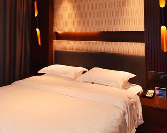 Huanpeng Esports Hotel - Weinan - Bedroom