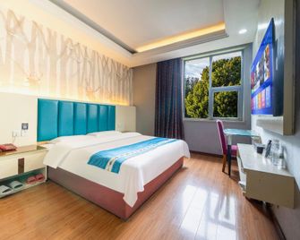Jinshan Business Hotel (Kaide Plaza) - Mianyang - Camera da letto