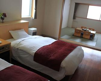 Hotel Unigoten - Rishirifuji - Slaapkamer
