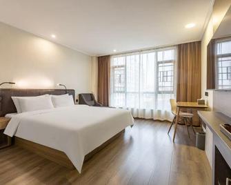 Hanting Hotel Poyang Wetland Park - Jingdezhen - Slaapkamer